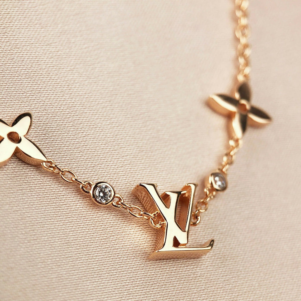 [LUXE JEWELRY]STAR AND SUN 7 MOTIFS GOLD BRACELET