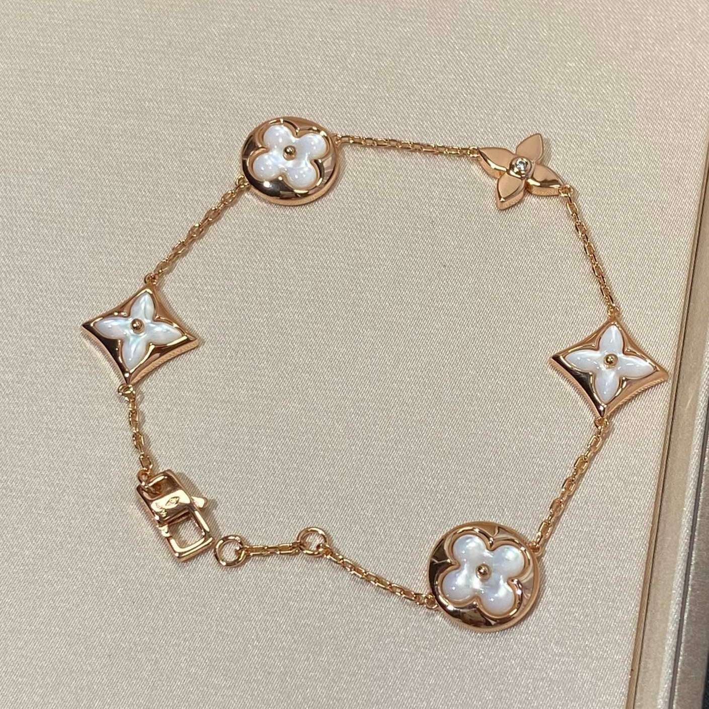[LUXE JEWELRY]STAR AND SUN 5 MOTIF MOP PINK GOLD BRACELET
