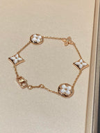 [LUXE JEWELRY]STAR AND SUN 5 MOTIF MOP PINK GOLD BRACELET