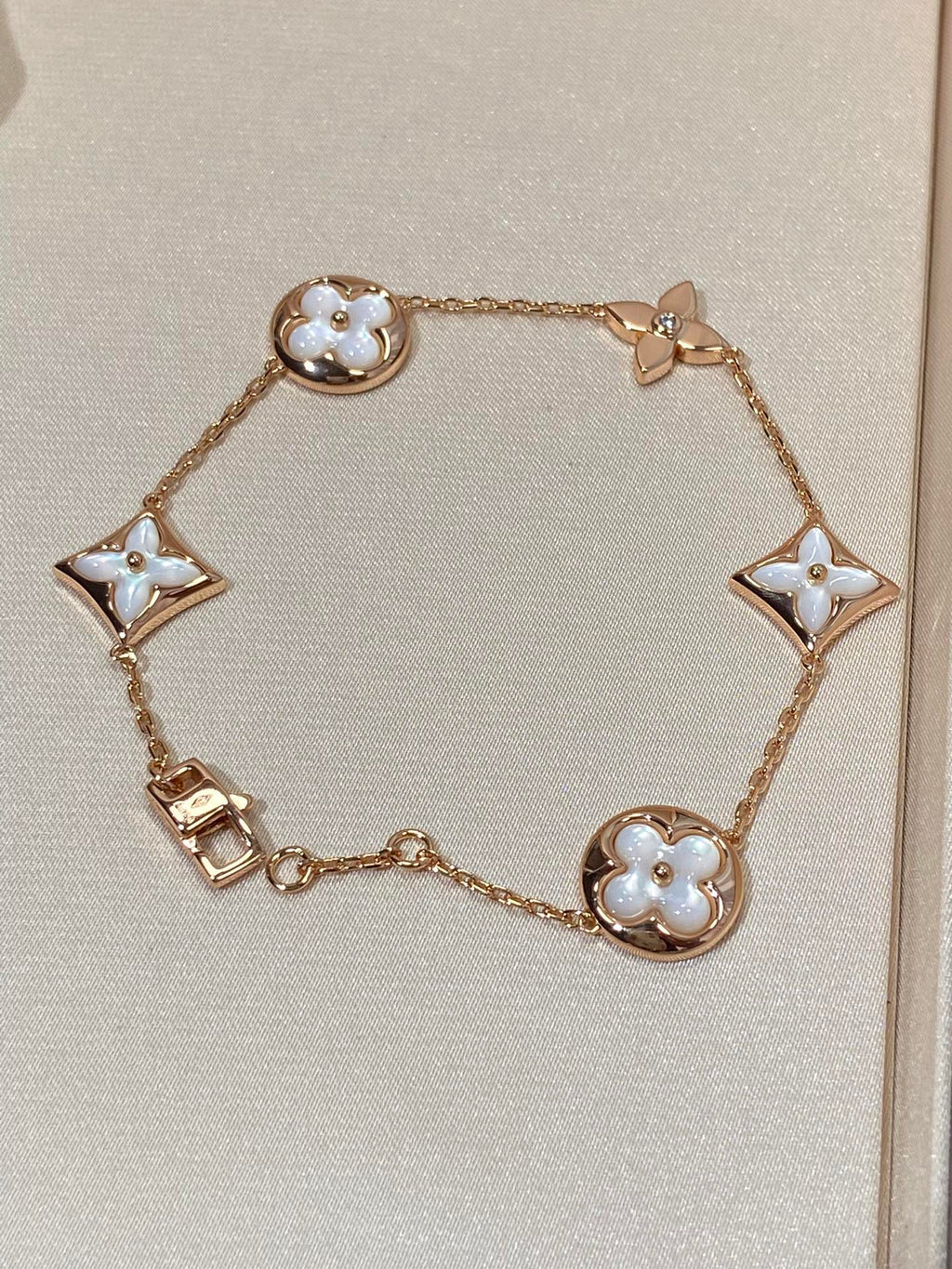 [LUXE JEWELRY]STAR AND SUN 5 MOTIF MOP PINK GOLD BRACELET