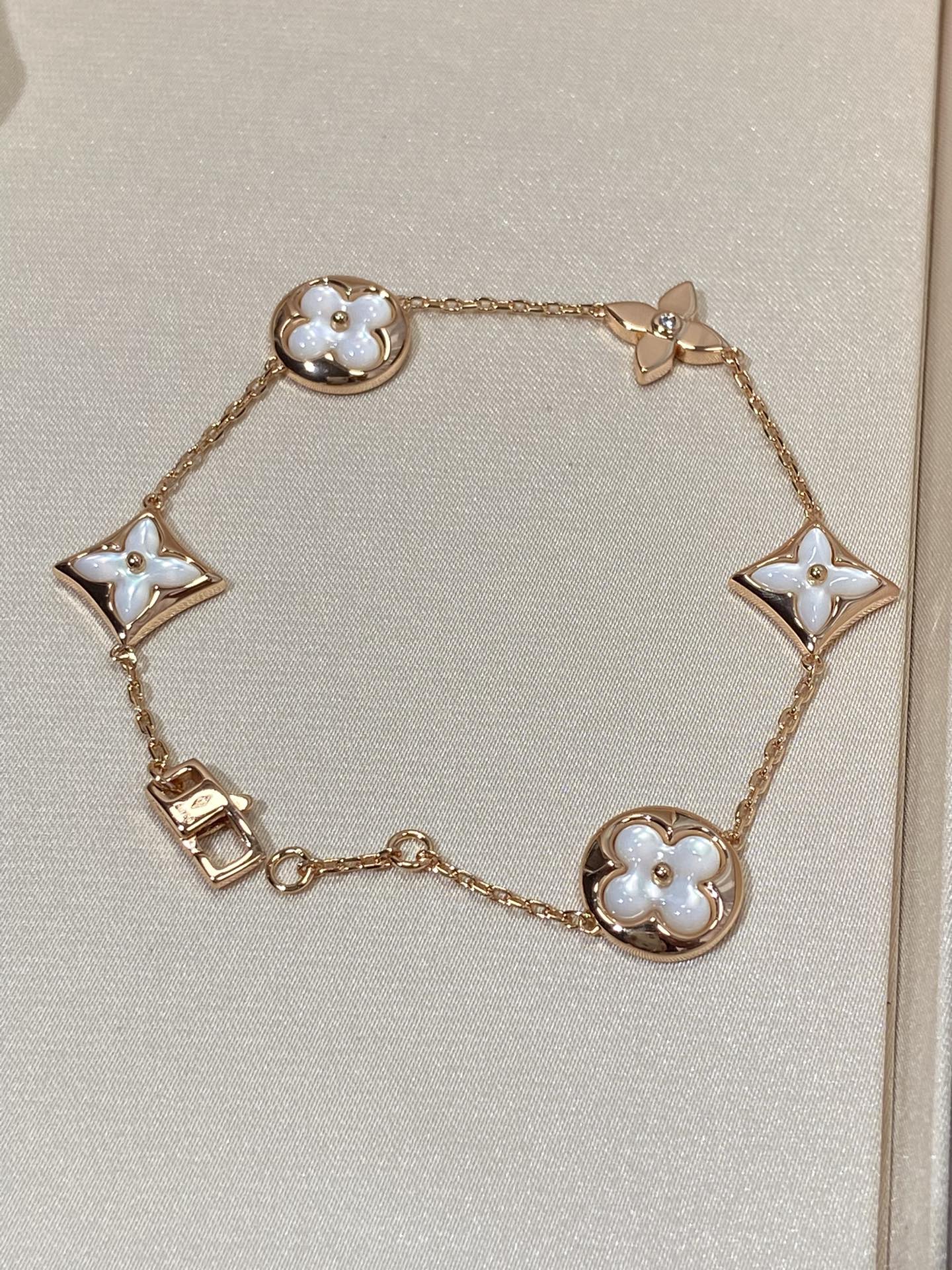 [LUXE JEWELRY]STAR AND SUN 5 MOTIF MOP PINK GOLD BRACELET