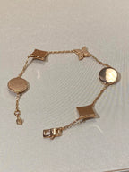 [LUXE JEWELRY]STAR AND SUN 5 MOTIF MOP PINK GOLD BRACELET