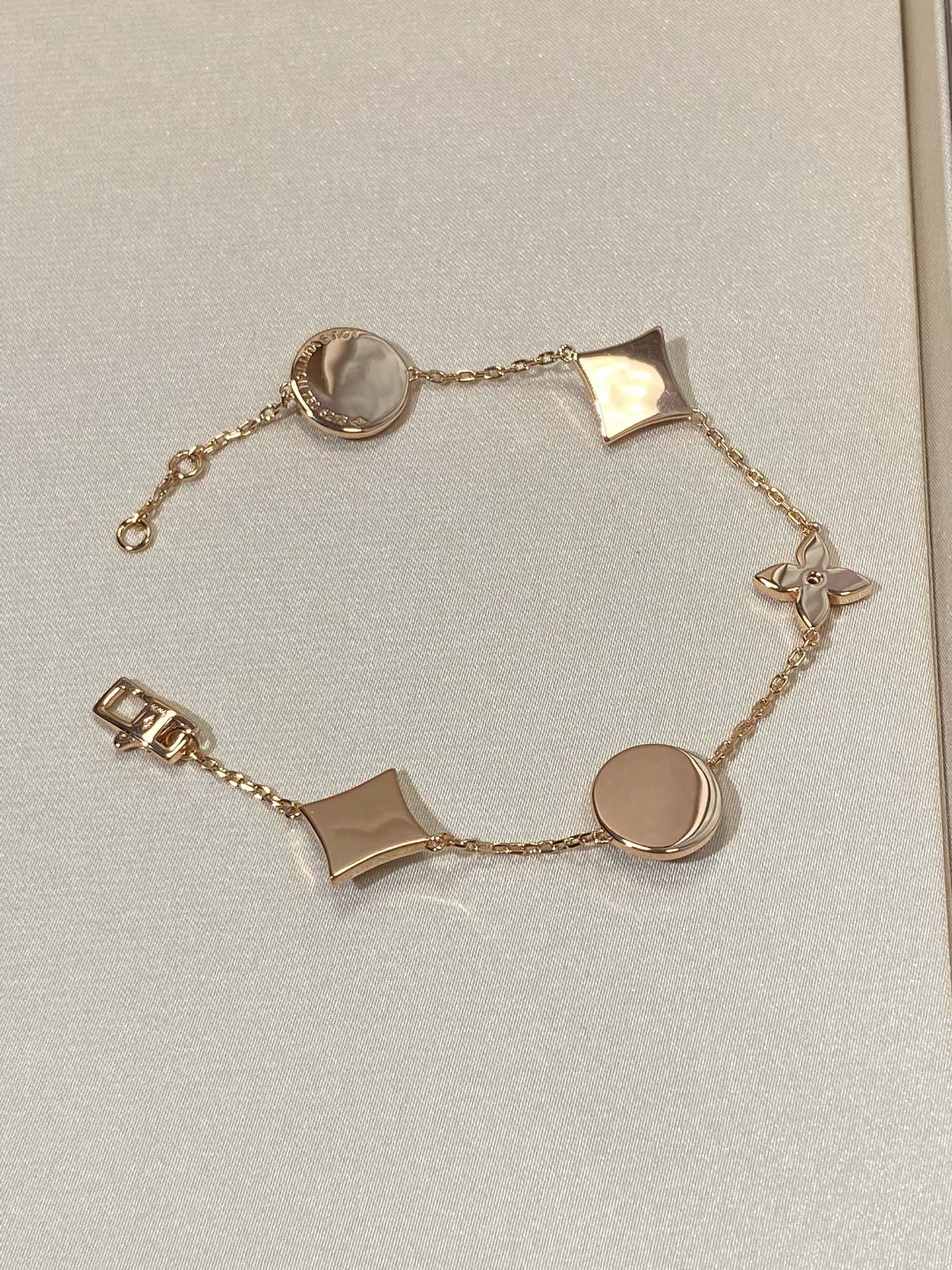 [LUXE JEWELRY]STAR AND SUN 5 MOTIF MOP PINK GOLD BRACELET