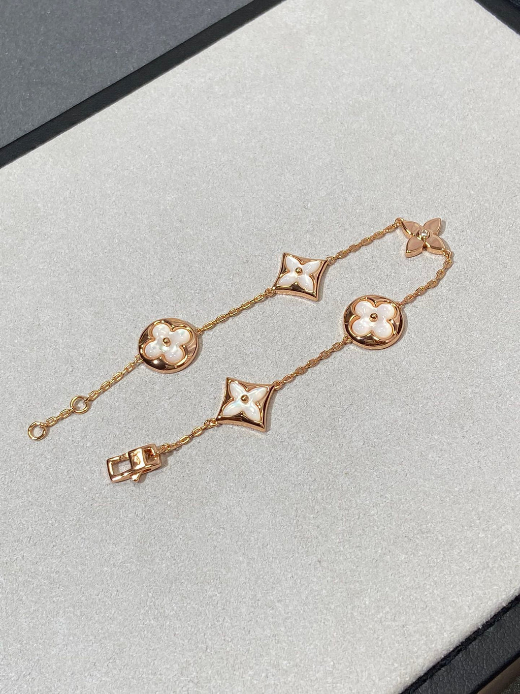 [LUXE JEWELRY]STAR AND SUN 5 MOTIF MOP PINK GOLD BRACELET