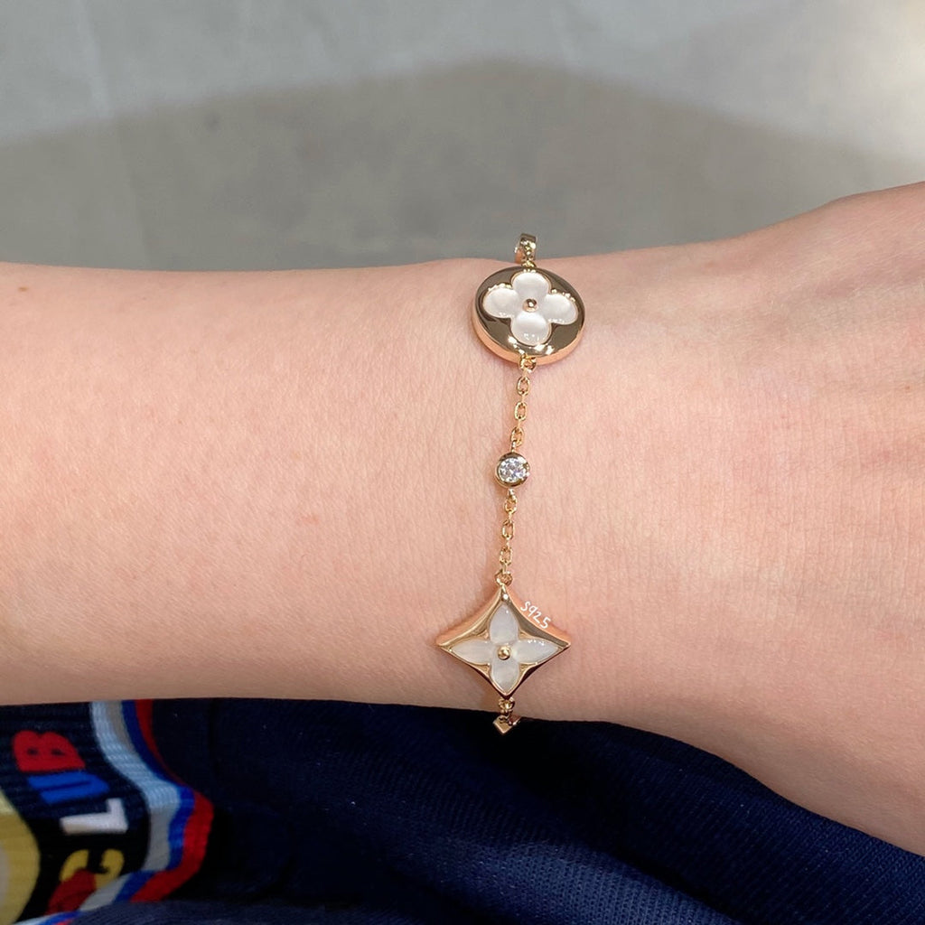 [LUXE JEWELRY]STAR AND SUN 4 MOTIF WHITE MOP PINK GOLD BRACELET