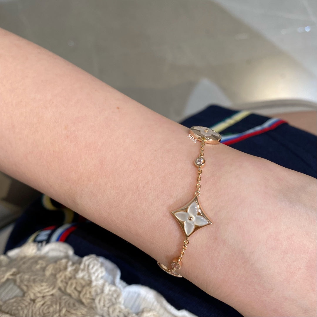 [LUXE JEWELRY]STAR AND SUN 4 MOTIF WHITE MOP PINK GOLD BRACELET