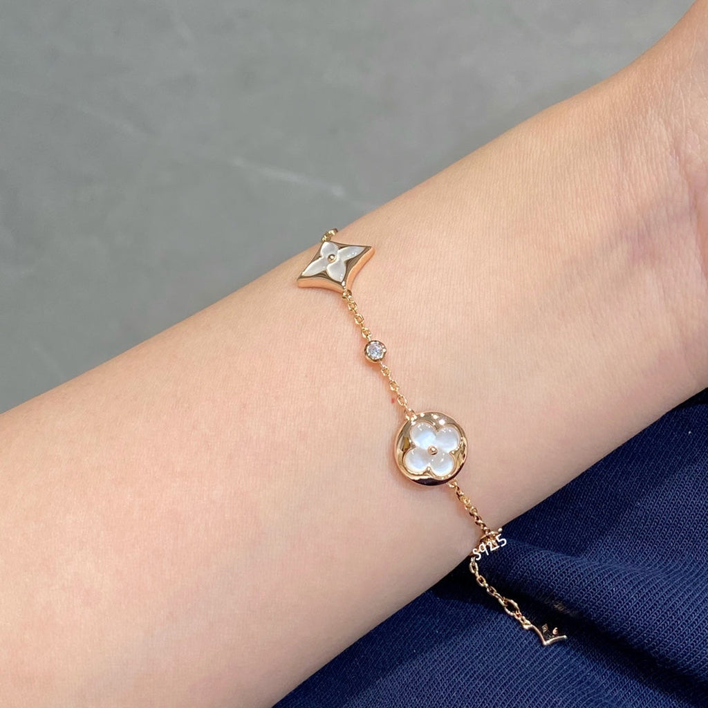 [LUXE JEWELRY]STAR AND SUN 4 MOTIF WHITE MOP PINK GOLD BRACELET