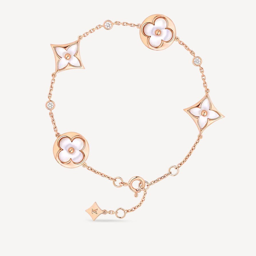 [LUXE JEWELRY]STAR AND SUN 4 MOTIF WHITE MOP PINK GOLD BRACELET