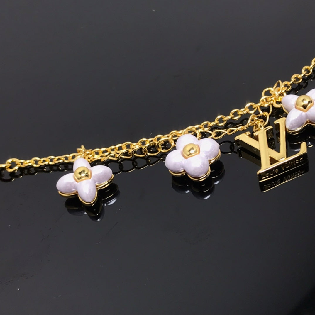 [LUXE JEWELRY]LOGO 6 MOTIF STAR AND SUN GOLD BRACELET