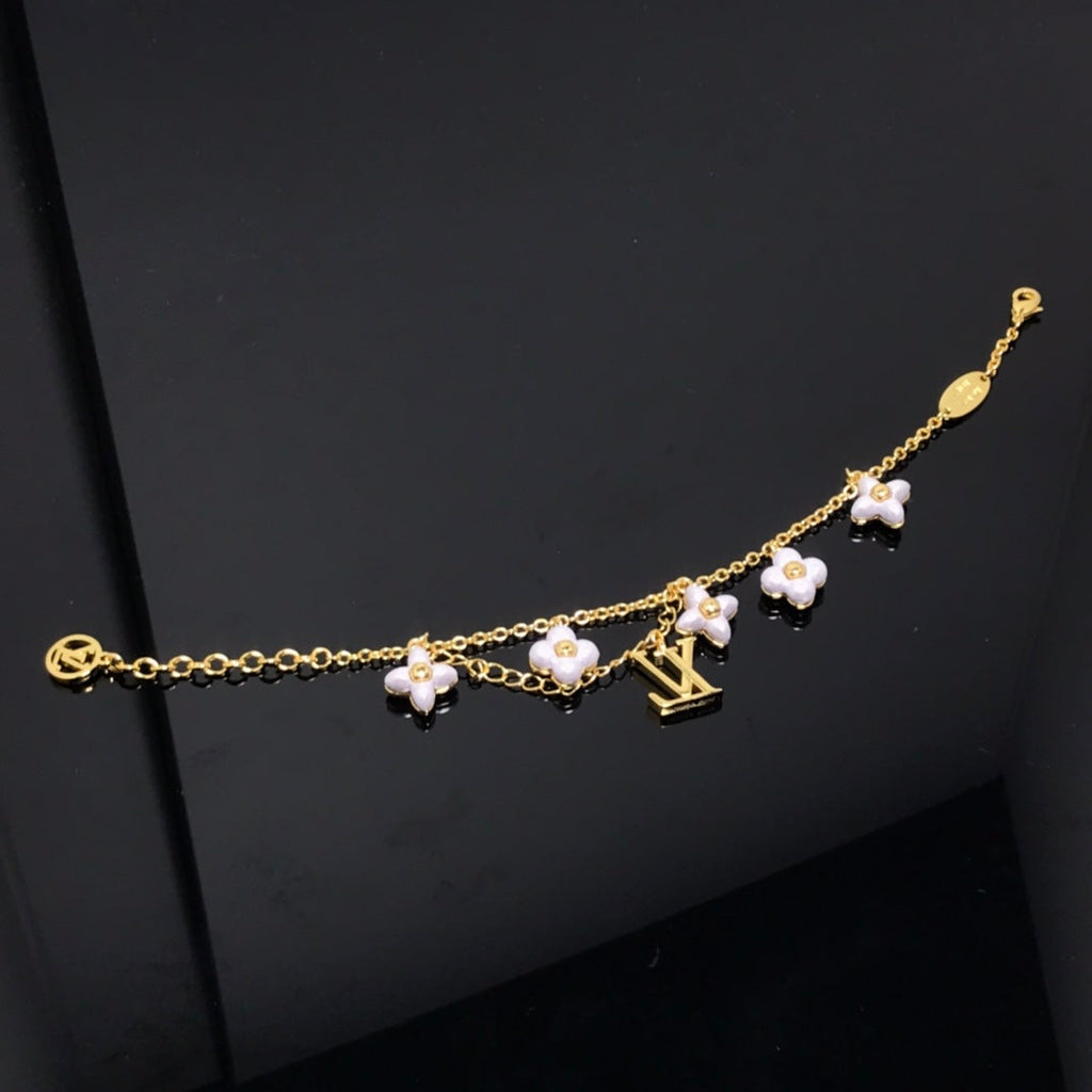 [LUXE JEWELRY]LOGO 6 MOTIF STAR AND SUN GOLD BRACELET