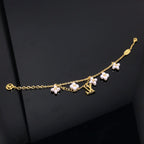 [LUXE JEWELRY]LOGO 6 MOTIF STAR AND SUN GOLD BRACELET